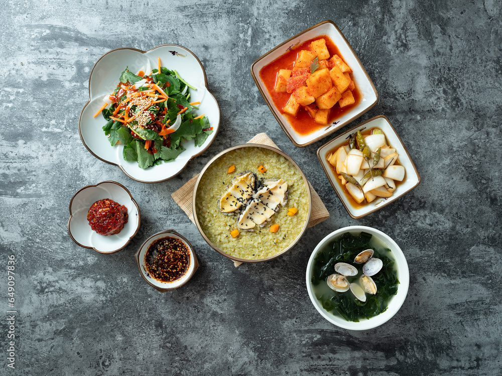 Abalone porridge, clam seaweed soup, and various side dishes