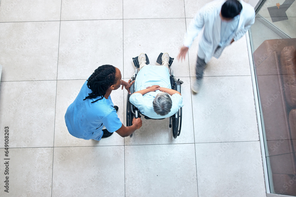 Wheelchair, hospital and patient above with nurse, helping and support with healthcare. Doctor, clinic and surgery care of an elderly man with a mobility disability ready for medical consultation