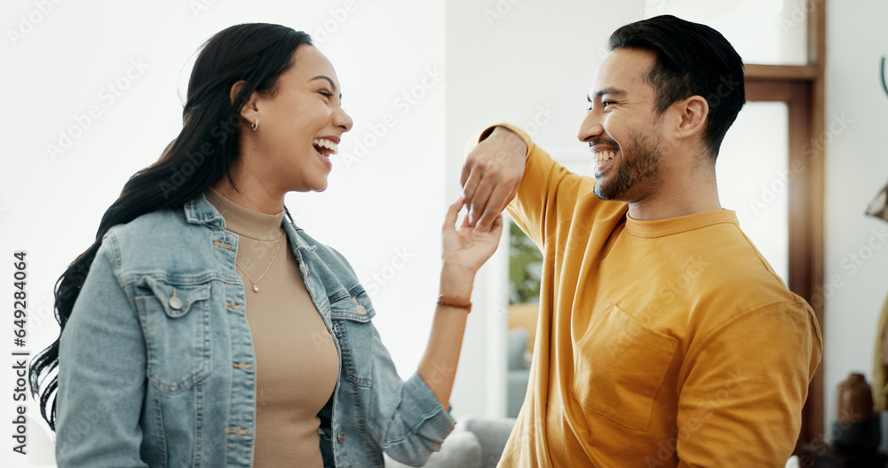 Couple, dancing in living room and love, bonding and happy people together at home. Healthy relationship, trust and support in commitment, partner and marriage, romance and intimacy with laughter