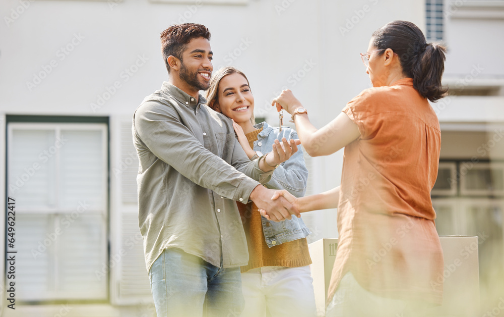 House key, realtor woman and handshake with couple outdoor as congratulations, thank you or sale. Excited man, partner and shake hands with real estate agent for new home, mortgage or future property