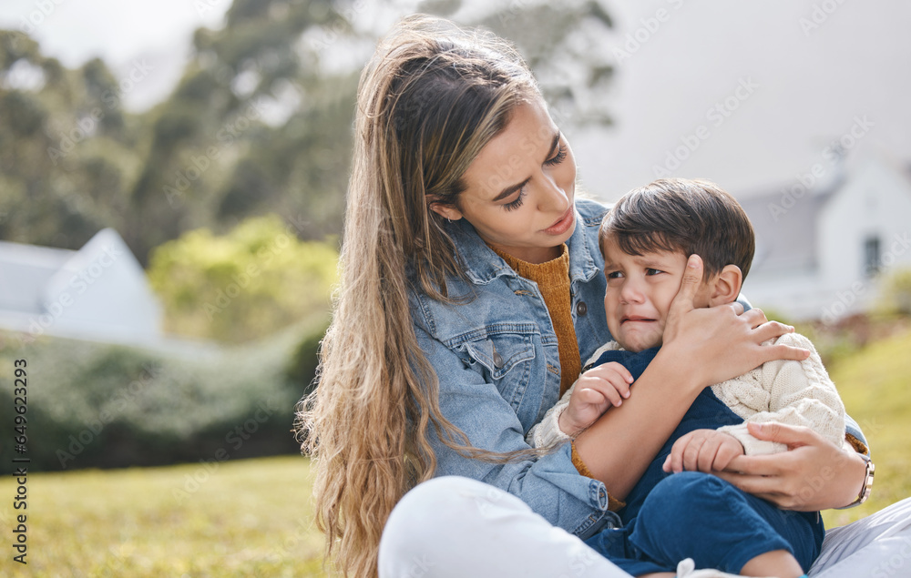 Outdoor, mother and kid crying, sad and comfort with pain, injury and support with unhappy expression. Family, mama and child in a backyard, upset and compassion with care, console and depression