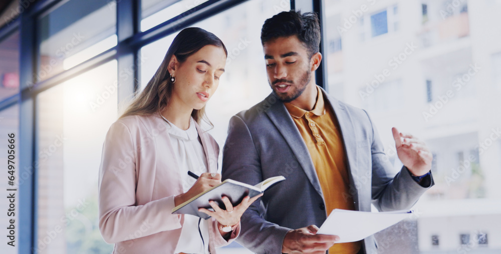 Collaboration, strategy and a business team walking in the office while talking about planning or the company mission. About us, teamwork and documents with corporate people writing in a notebook