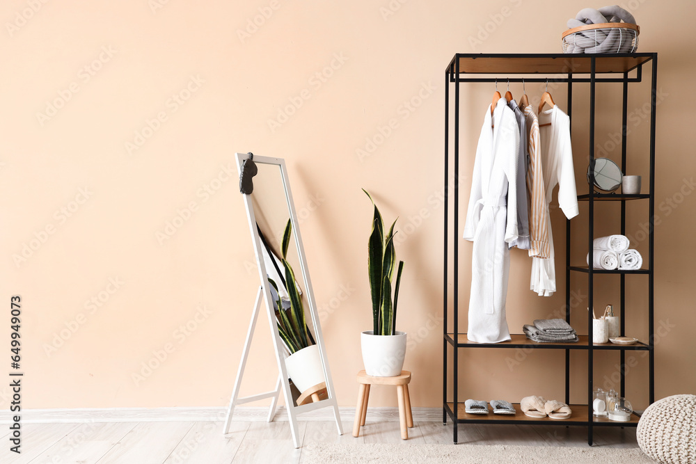 Interior of room with shelving unit and bath accessories