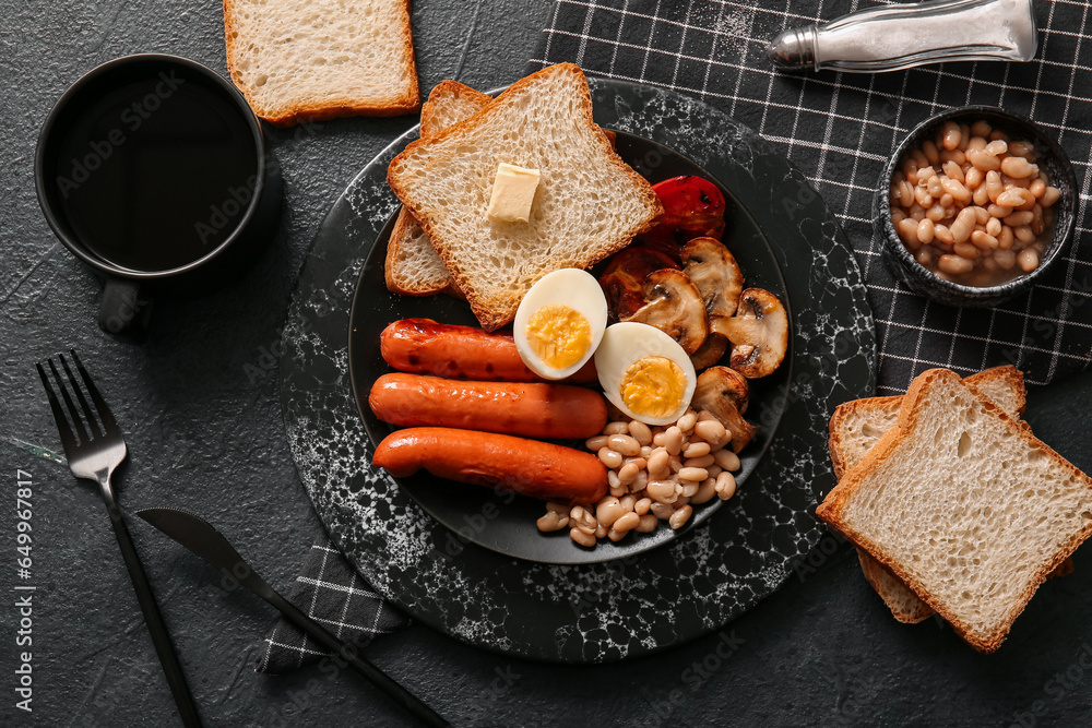 Plate with tasty English breakfast and cup of coffee on black background