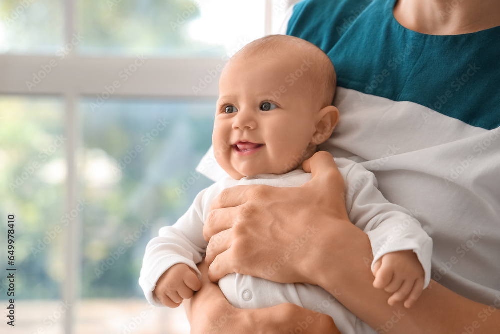 Father with his little baby at home, closeup