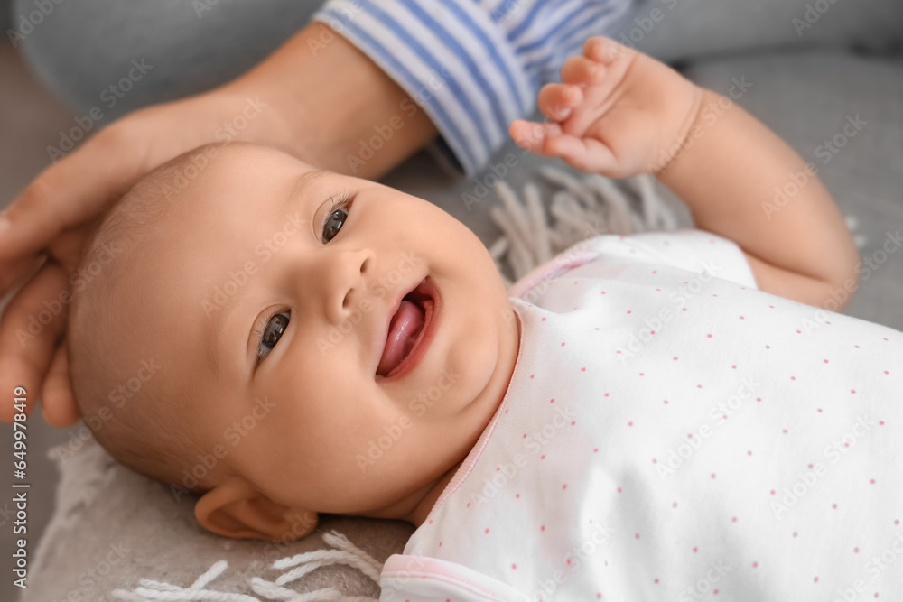 Father with his little baby at home, closeup