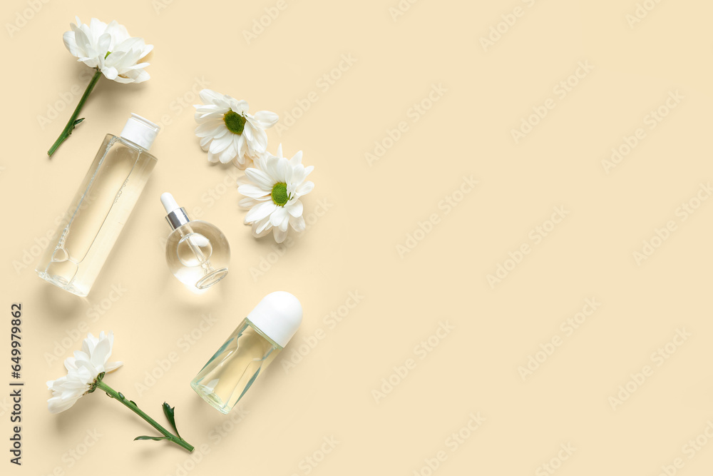 Composition with cosmetic products and chamomile flowers on color background