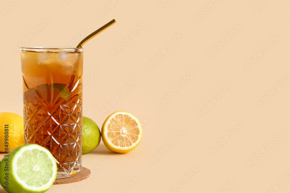 Glass of cold Long Island iced tea on light background