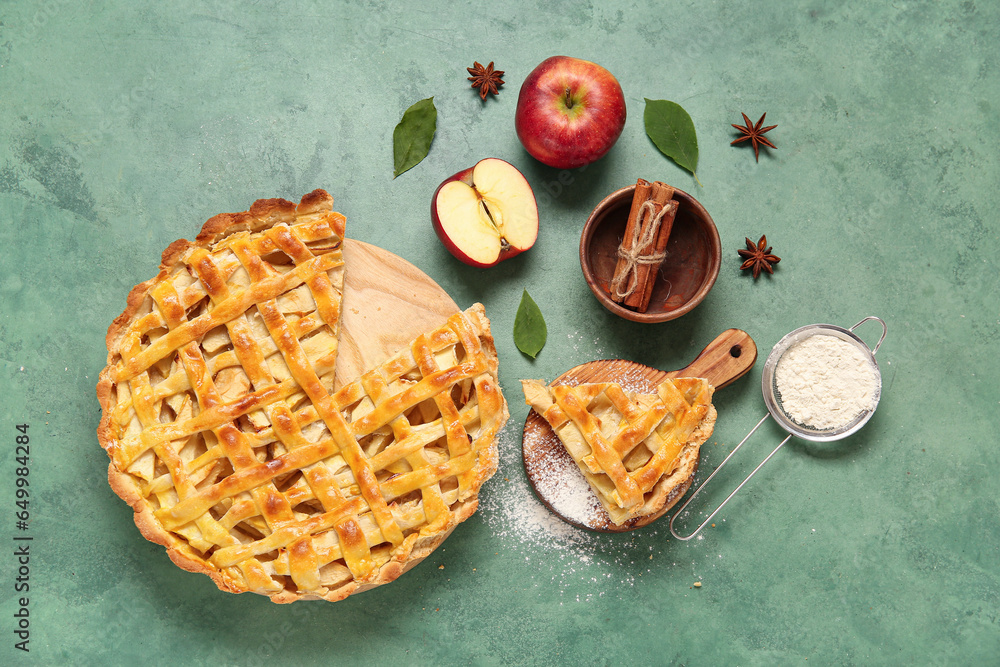 Delicious apple pie on green background