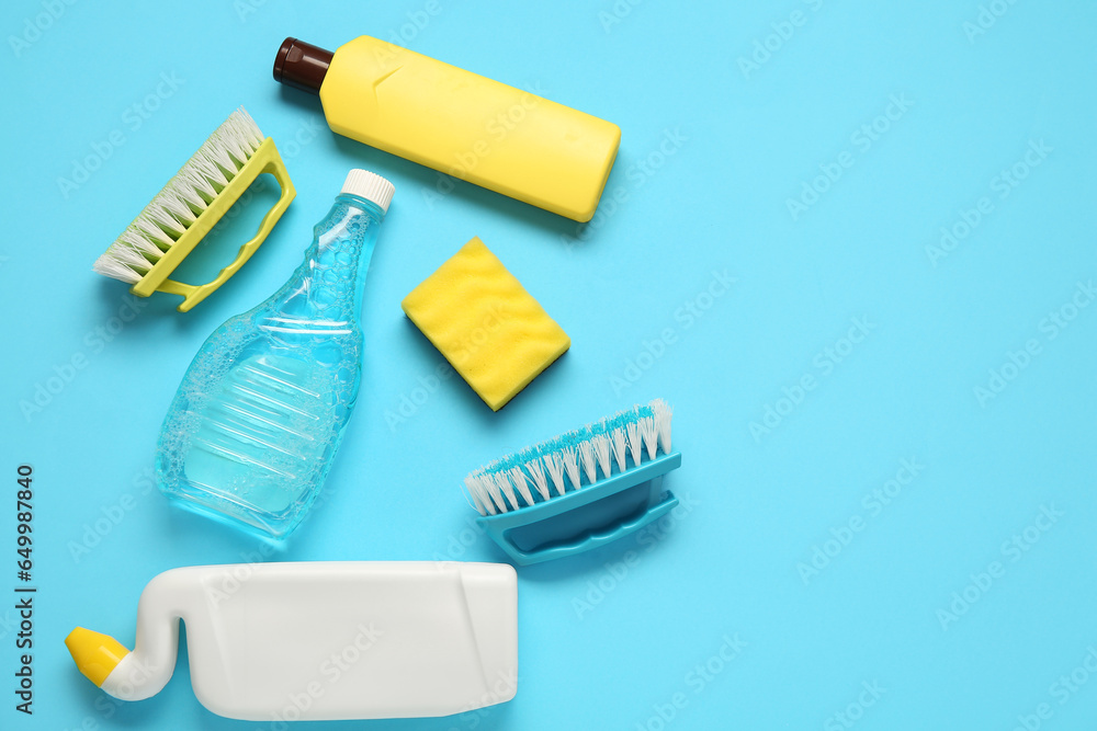 Set of cleaning products on blue background