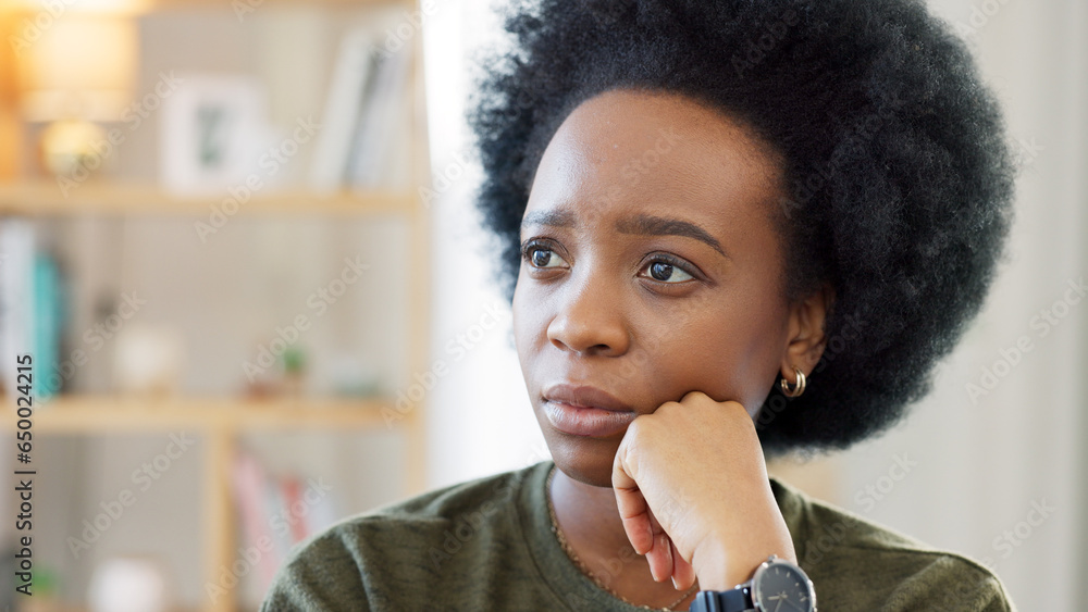 Black woman, stress and thinking in a home with memory and idea in a living room. African female person, anxiety and house with grief, burnout and thoughtful with depression and mental health