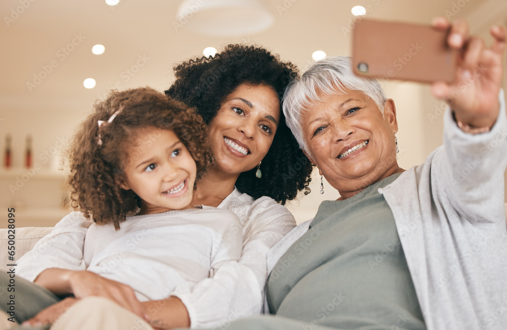 Family, selfie and living room with a grandmother, mom and child together with love and care. Bonding, sofa and happy mother with young girl and senior woman with photo for social media with kid