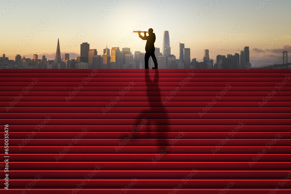 Side view of businessman silhouette with telescope looking into the distance on red stairs with shadow and city skyline in the background. Success, tomorrow, future and vision concept.