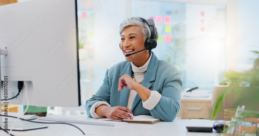 Consultant, senior woman and talking with technology at office for customer service at help desk call center. Sales, telemarketing and mature employee with headphones at work for crm with technical s