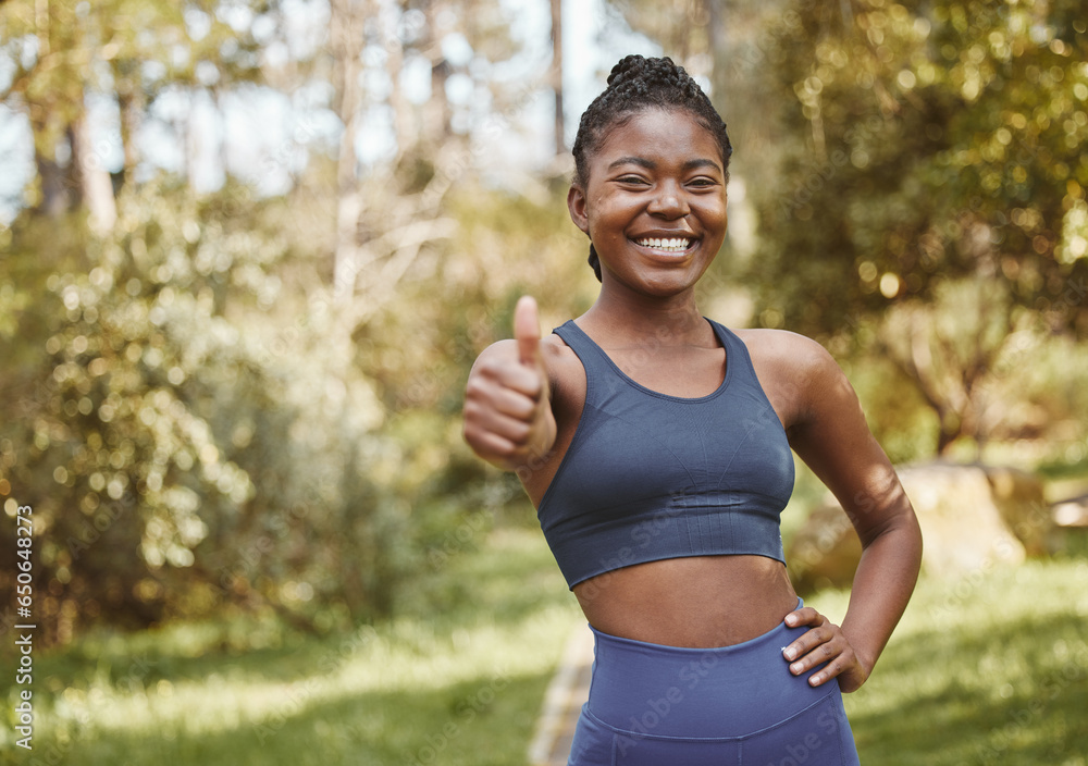 Black woman, portrait and thumbs up in nature for fitness, training or outdoor workout achievement. Happy African female athlete or runner smile with like emoji, yes sign or OK in success or exercise