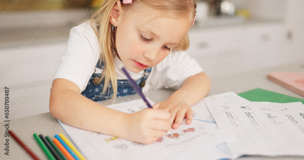 Education, homeschool and child writing, color and learning for development, growth and kindergarten homework. Home study, drawing and happy girl with school project in notebook on kitchen counter.