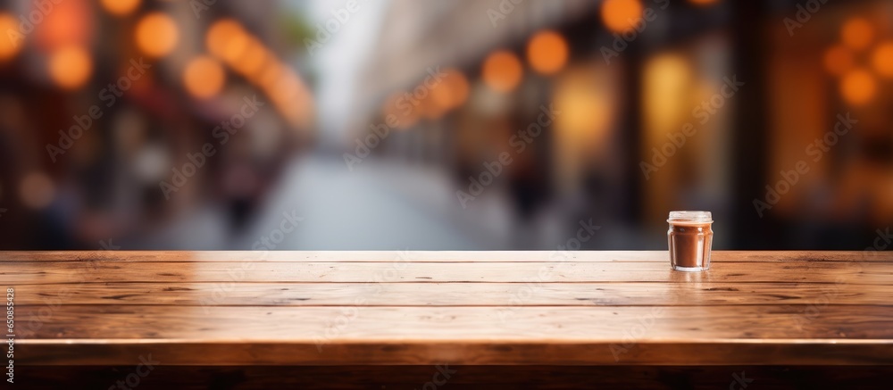 Defocused coffee shop with empty table space for text