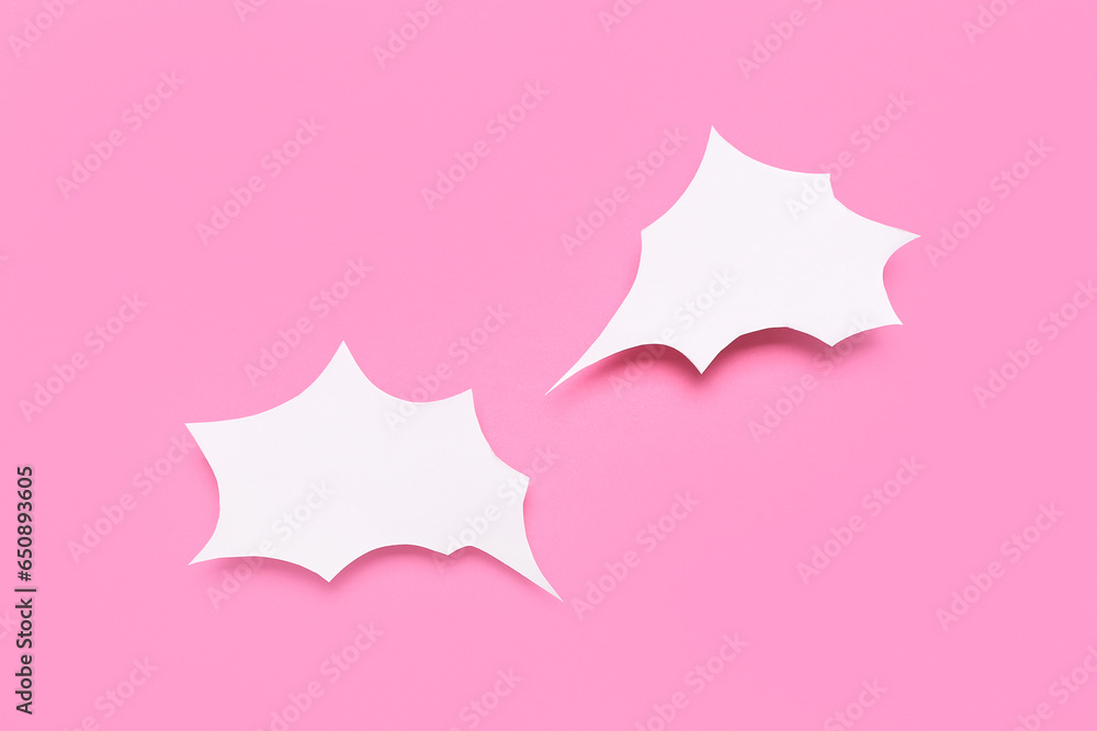 Blank speech bubbles on pink background