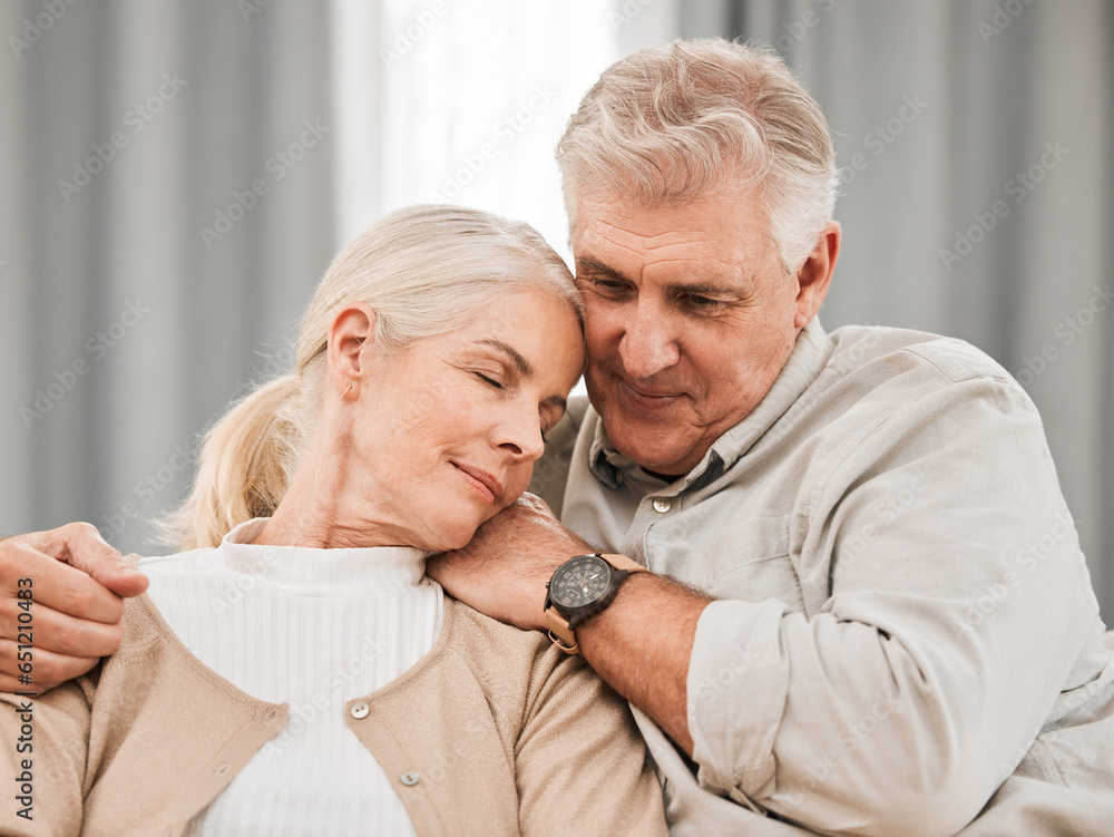 Old people, hug and relax on sofa with love and support, bonding while at home with trust and comfort. Couple with time together, marriage or life partner with retirement, calm and peace of mind