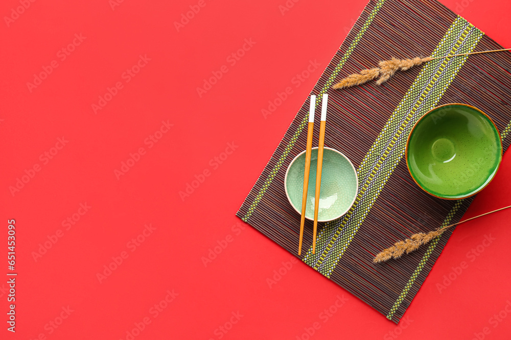 Chinese table setting on red background