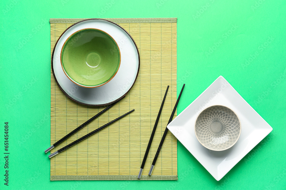 Chinese table setting on green background