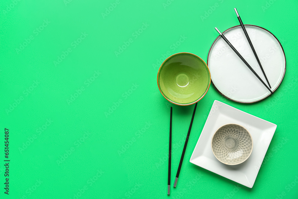 Chinese table setting on green background