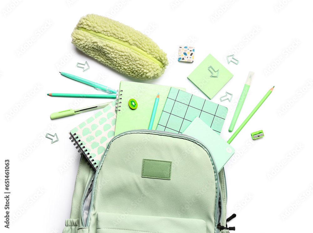 Stylish school backpack with pencil case and different stationery supplies on white background