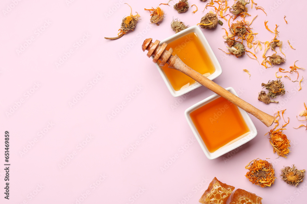 Composition with tasty honey, honeycomb, dipper and dried dandelion flowers on purple background