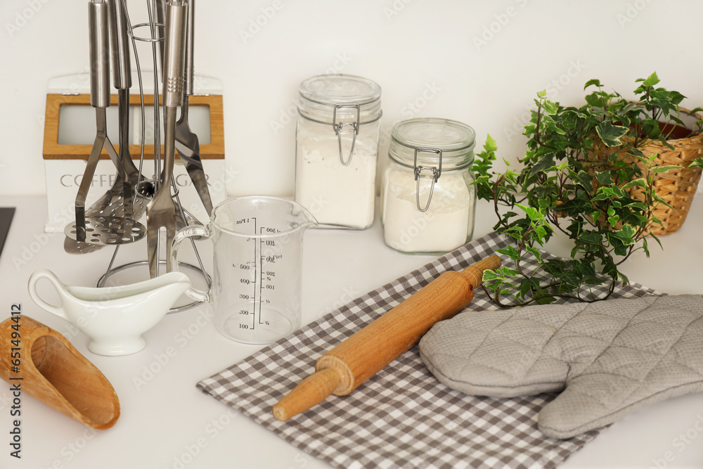 Modern kitchen with ingredients and set of utensils for bakery