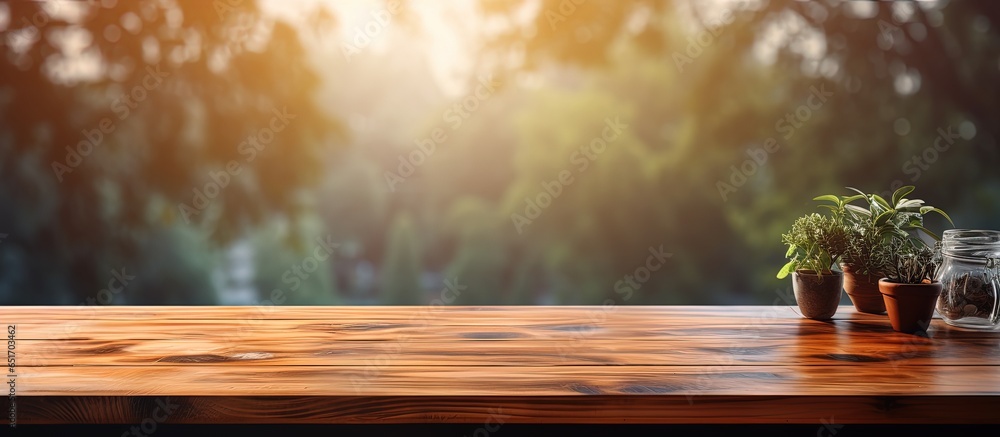 Wooden table top against blurred kitchen window background