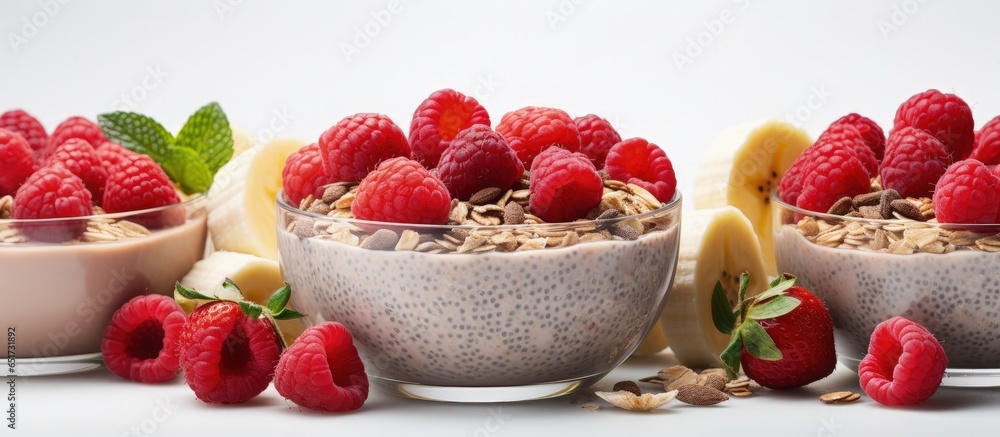 Healthy breakfast bowl with banana smoothie goji berries raspberry sunflower and chia seeds