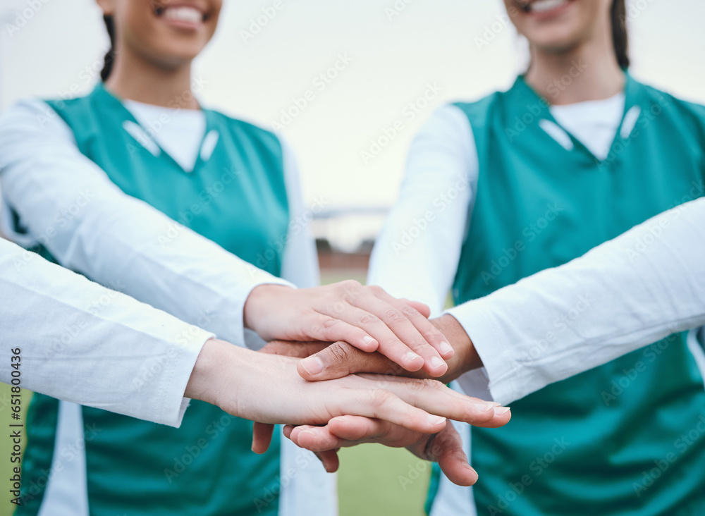 Hands, sports group or team in huddle with support, smile or plan for a hockey training game. Women, stack or happy female athletes in practice for exercise or match together with pride or teamwork