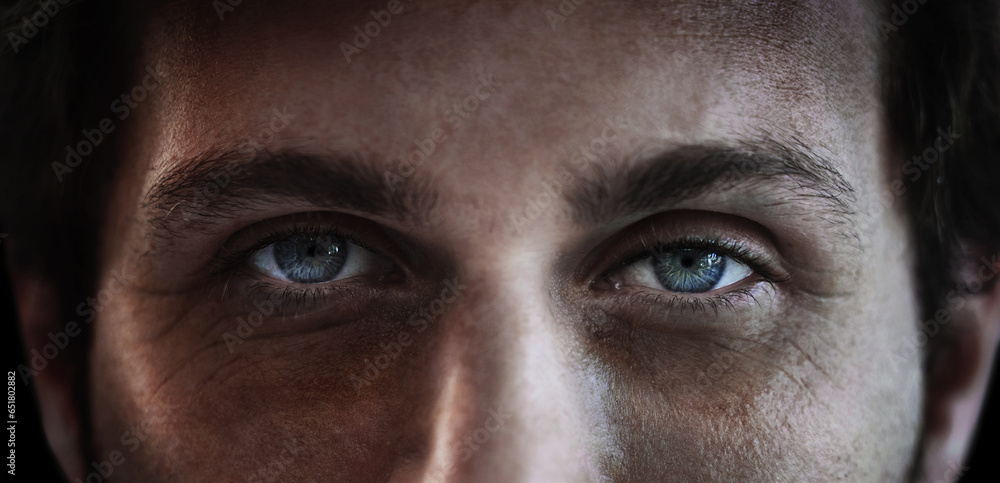 Eyes, vision and a man closeup in studio on a dark background for mental health or depression. PTSD, trauma or awareness and pupil portrait of a person looking serious about a memory and idea