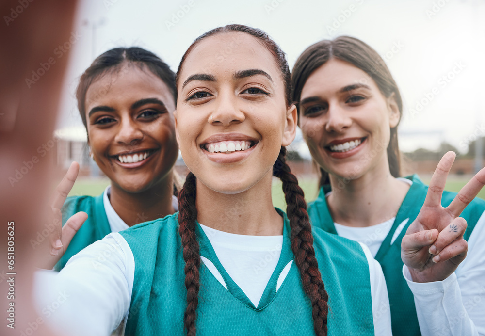 Sports women, team selfie and peace sign on field for memory, competition and portrait for fitness. Girl group, photography and post on social media with emoji, v icon and diversity for hockey game