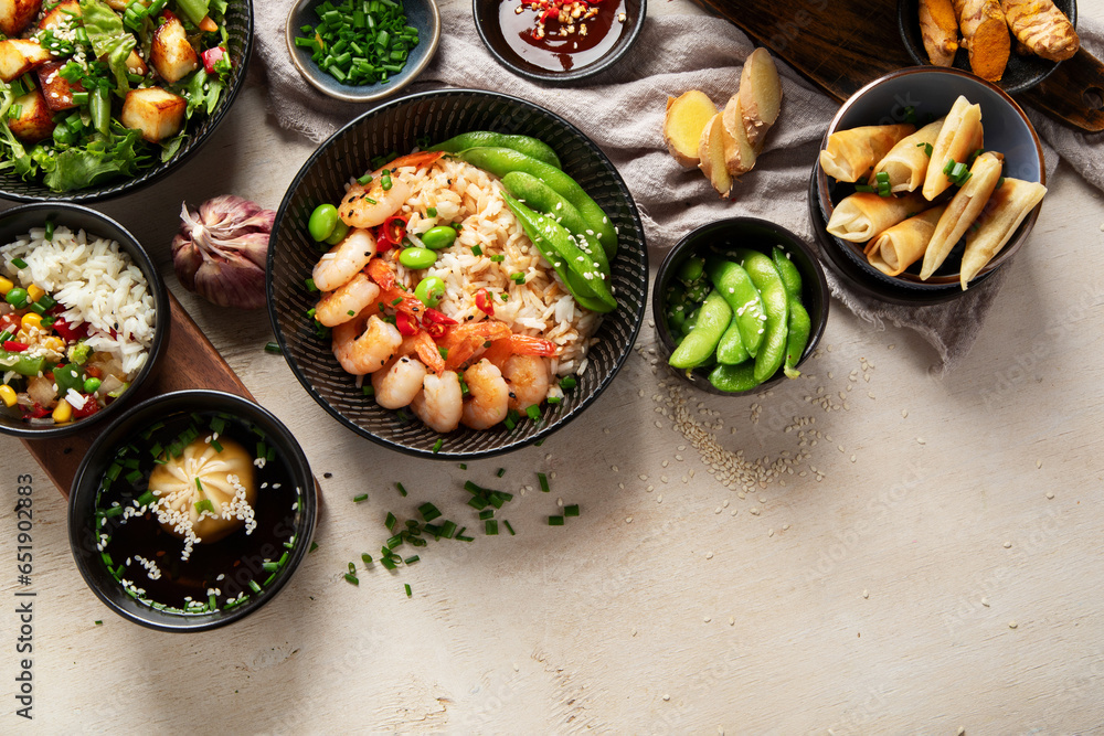 Asian food background with various ingredients on white background , top view.