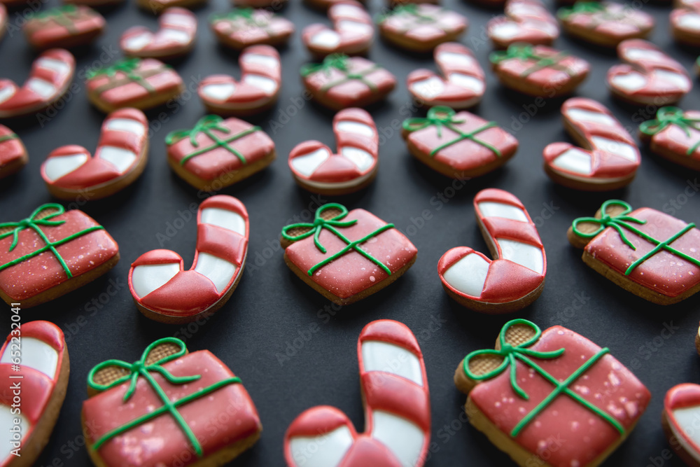 Christmas gingerbread covered with multi-colored icing, close-up.