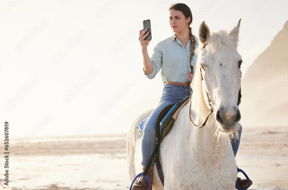 Horse riding, phone and woman on beach with pet for travel using social media, website and web for chatting. Texting, picture and person or rider with animal on vacation or holiday at sunrise