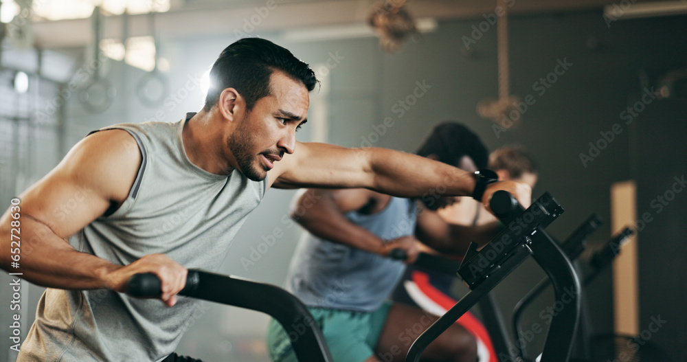 People, diversity and cycling at gym in workout, exercise or intense cardio fitness together and motivation. Diverse group burning sweat on bicycle machine for healthy body, wellness or lose weight