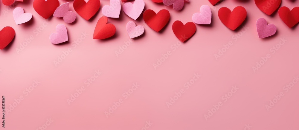 Red heart flat lay on pink background for Valentine s Day