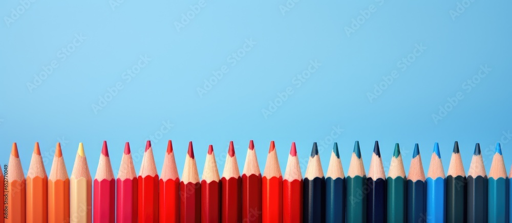 A single red pencil on a blue background symbolizing leadership and standing out from the crowd