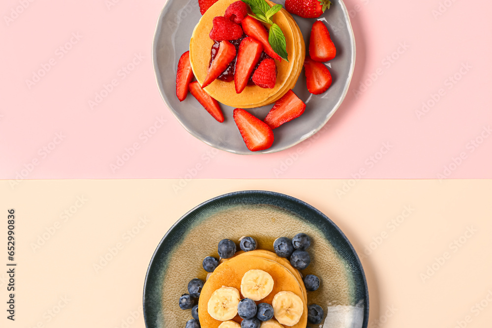 Plates with sweet pancakes and berries on color background