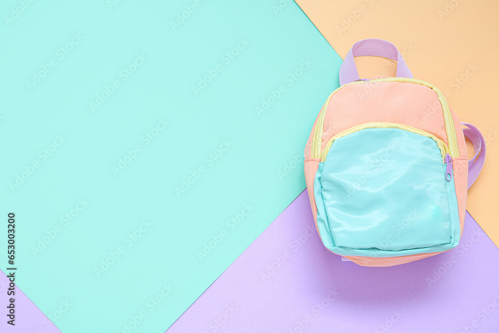 Stylish school backpack on color background