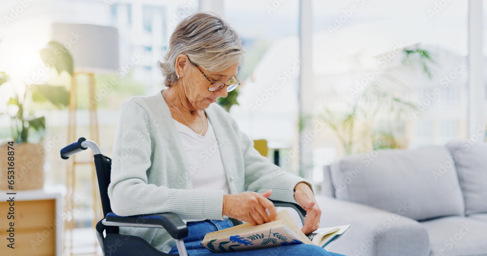 Senior woman, book and reading to relax in living room for story, novel and knowledge. Elderly female in wheelchair, enjoying books and focus in lounge for retirement break, literature and hobby at r