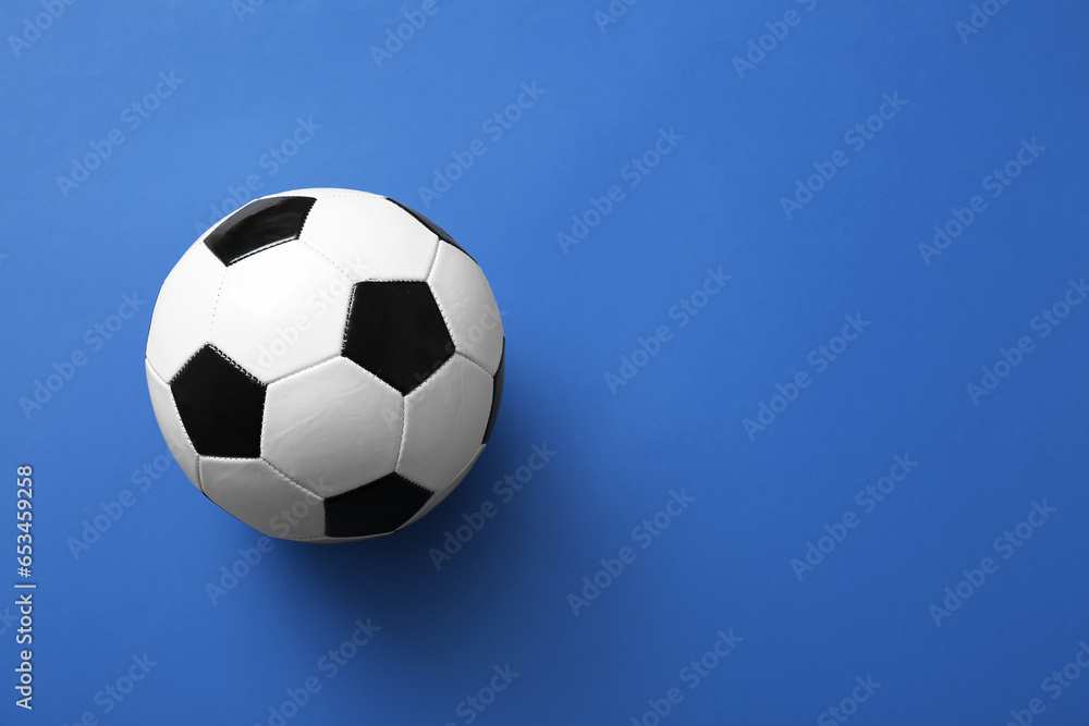 Soccer ball on blue background