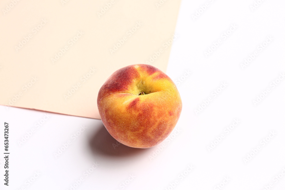 Sweet peach on colorful background