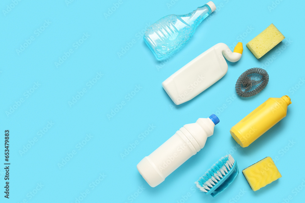 Set of cleaning products on blue background