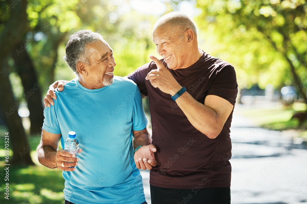 Mature, people and walk for wellness in closeup while talking, smile and bond. Elderly, men or friends for fitness, health or exercise in park for laugh, point and embrace in happiness for retirement