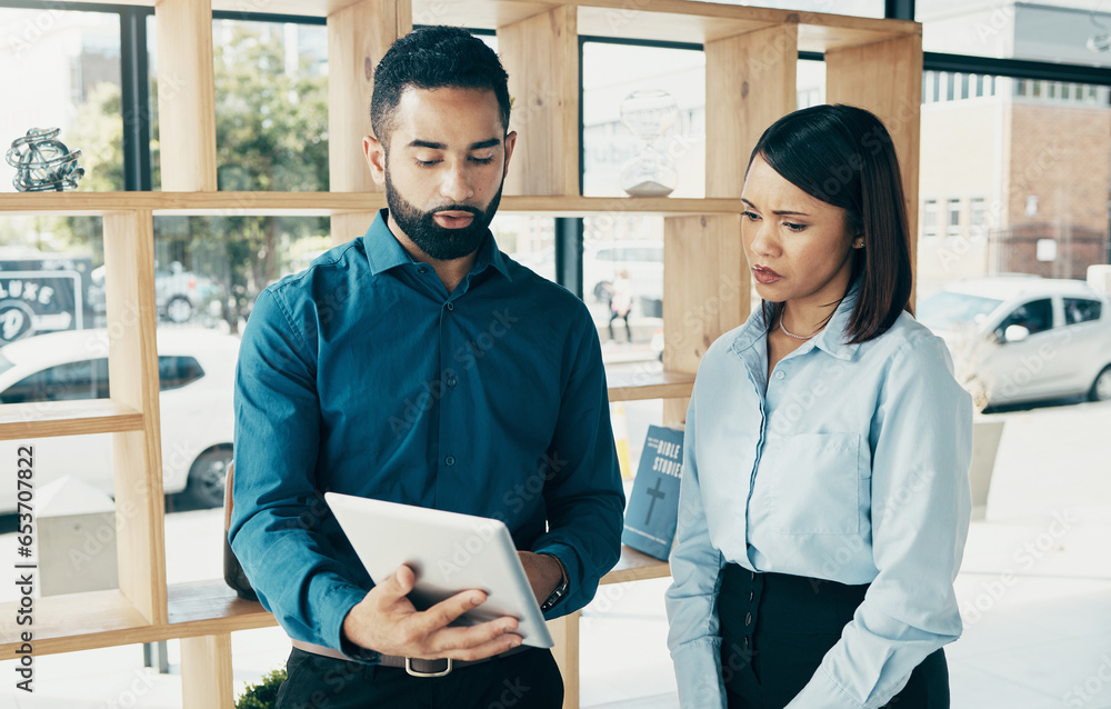 Business, woman and man with tablet for communication, meeting and project management in office. Professional, people and employees with touchscreen for planning, discussion or recruitment at work