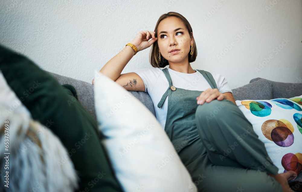 Woman, face and thinking on couch of home for peace, relaxing and living room in apartment. Person, calm and wellness for self care and zen with ideas, thoughts and inspiration in lounge on sofa