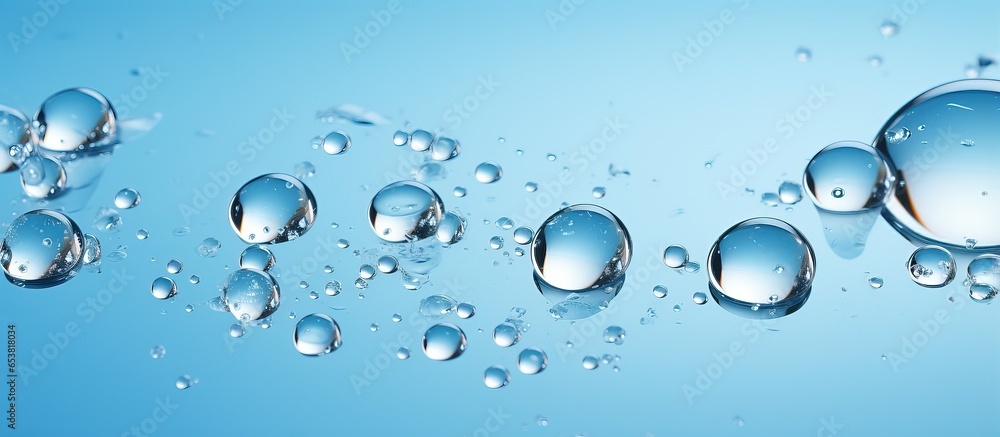 Pastel blue backdrop with droplets